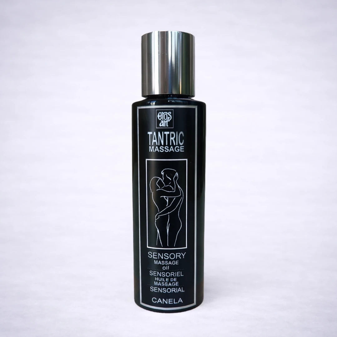 Aceite de masaje tántrico de canela Tantric Massage Eros Art sobre fondo gris claro, aceite sensorial para masaje