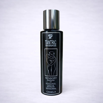 Aceite de masaje tántrico de canela Tantric Massage Eros Art sobre fondo gris claro, aceite sensorial para masaje