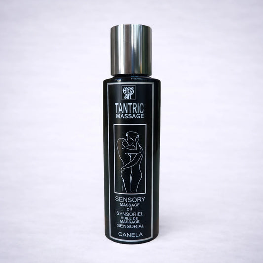 Aceite de masaje tántrico de canela Tantric Massage Eros Art sobre fondo gris claro, aceite sensorial para masaje