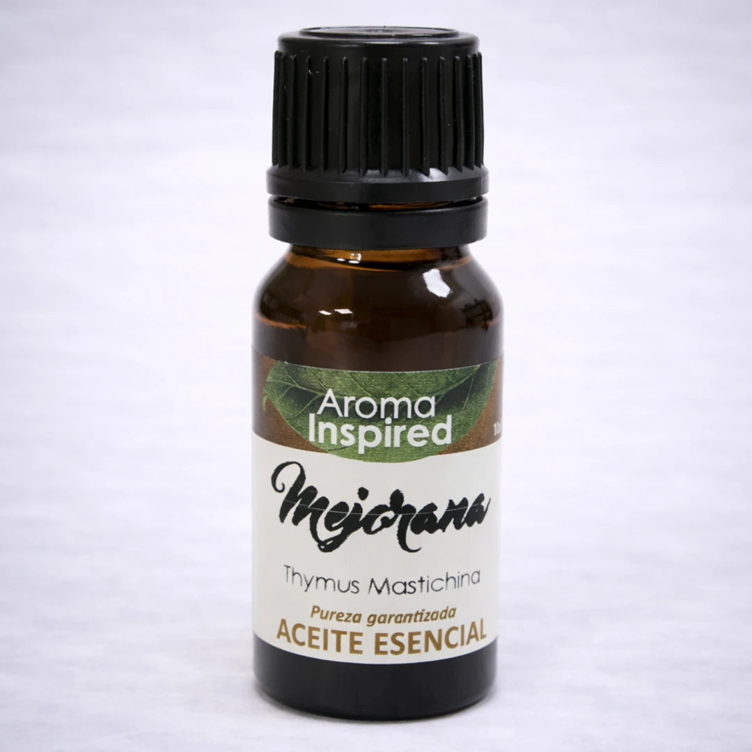Aceite esencial de mejorana natural en frasco de vidrio ámbar, aroma herbal suave para relajación y equilibrio