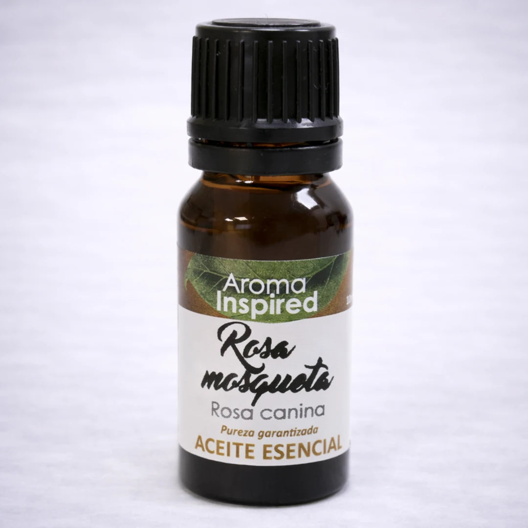 Aceite esencial de rosa mosqueta natural en frasco de vidrio ámbar, cuidado de la piel y bienestar aromático