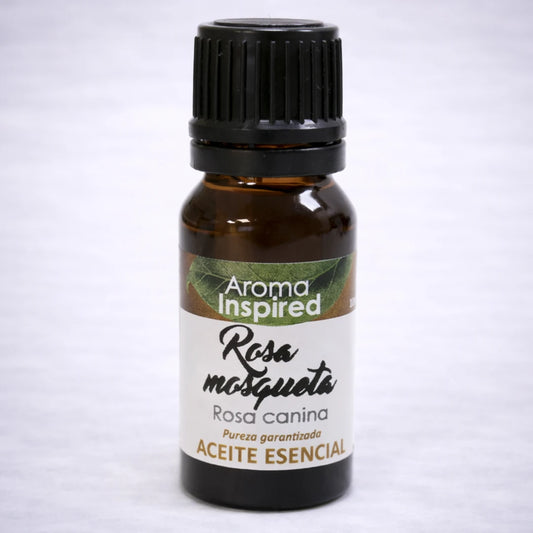 Aceite esencial de rosa mosqueta natural en frasco de vidrio ámbar, cuidado de la piel y bienestar aromático