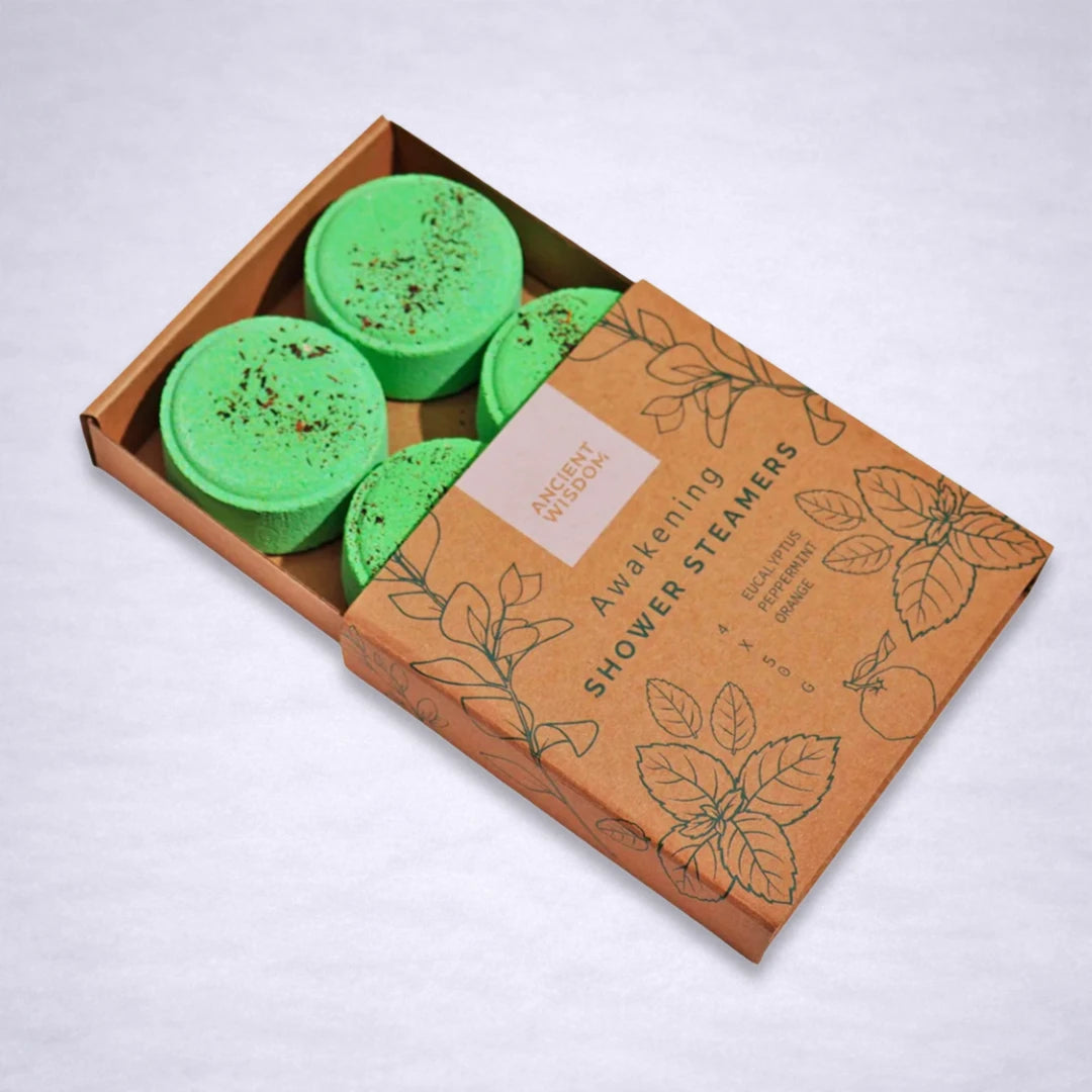Vaporizadores de ducha Awakening con eucalipto, menta y naranja en caja kraft abierta, ducha revitalizante con aromaterapia