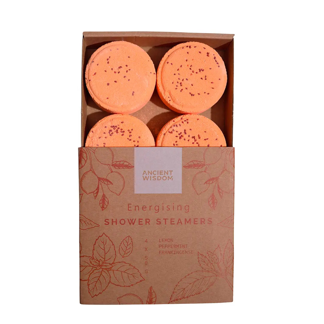 Caja abierta de Vaporizadores de Ducha ZEN – Energizante con cuatro discos naranjas aromáticos de aceites esenciales de limón, menta e incienso.
