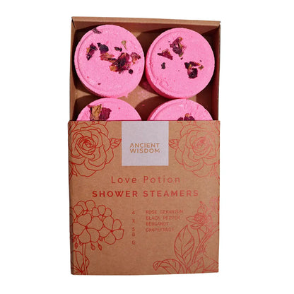 Caja de 4 vaporizadores de ducha Poción de Amor con pétalos de rosa visibles en la parte superior, aromaterapia natural con aceites esenciales.
