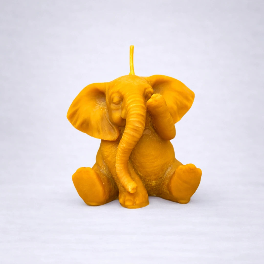 Vela artesanal de cera de abeja en forma de elefante, hecha a mano, símbolo de visión y calma