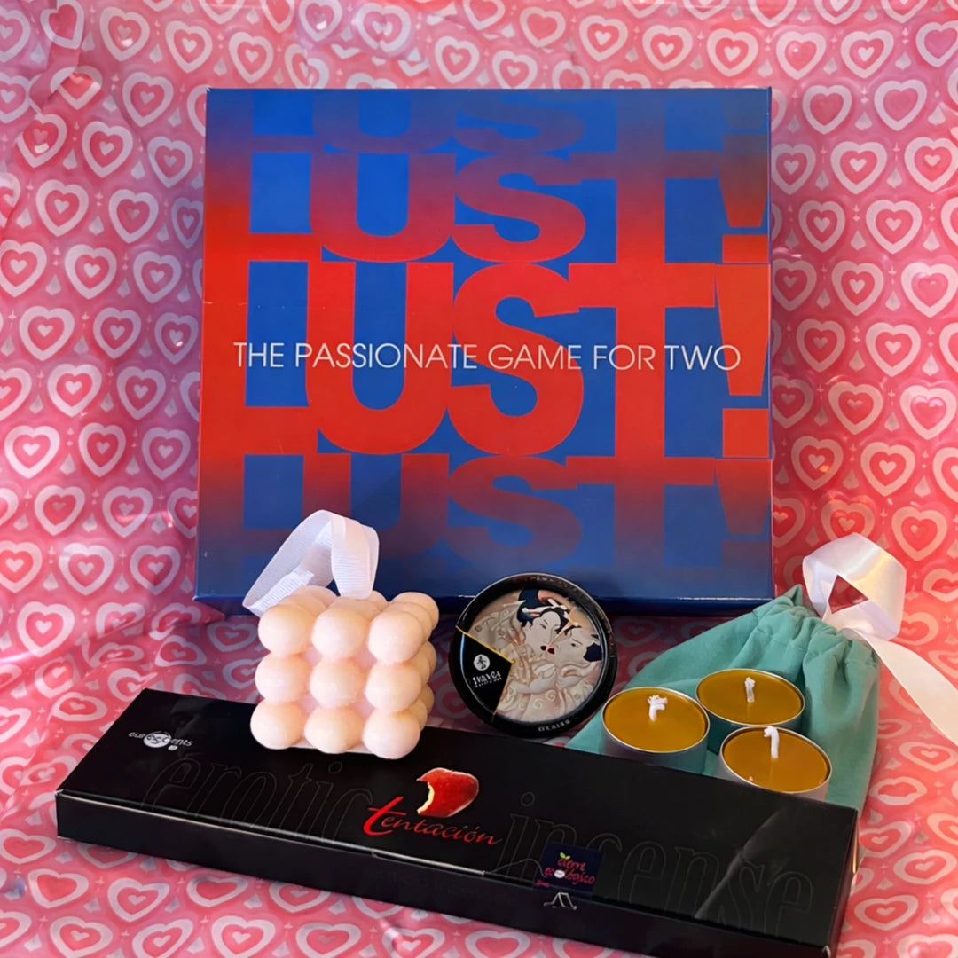 Pack Ritual Sensorial con juego de pareja, velas aromáticas y elementos de ritual presentados juntos para una experiencia íntima y consciente