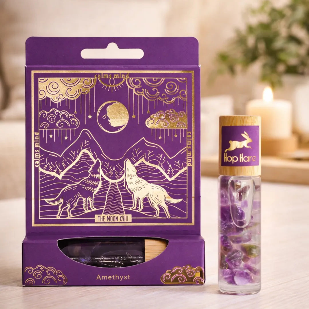 Roll-on aromático de amatista con packaging y aceites esenciales