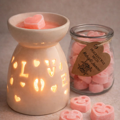 Vaporizador cerámico con luz cálida y ceras aromáticas rosas en forma de corazón, set de aromaterapia para crear un ambiente relajante y romántico